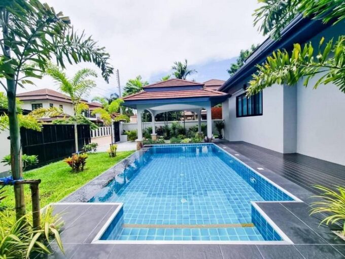 Pool villa residence located near Aquaverse Water Park in Pattaya, adjacent to Nong Nooch Garden Pattaya, featuring 4 bedrooms and 5 bathrooms