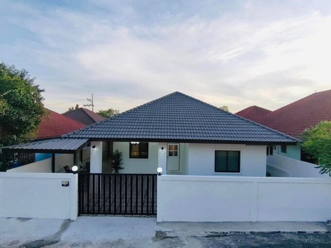 Single-family home in Pattaya within a residential development, located near Tara Phatthana International School. The property offers a tranquil and secure environment, featuring contemporary interior and exterior design