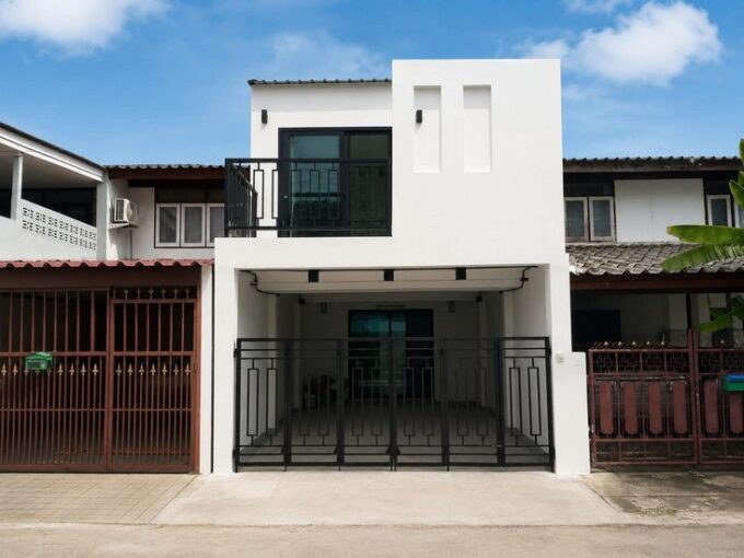 Contemporary two-story townhouse located behind Lotus Thepprasit and the Pattaya Outlet Mall, featuring 2 bedrooms and 2 bathrooms