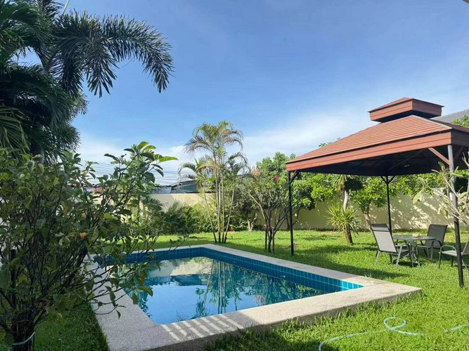 This Pattaya Villa with a private swimming pool, an expansive garden, and a substantial plot of land (126 square wa or 504 square meters). It is situated adjacent to the railway line within a tranquil and secure gated community